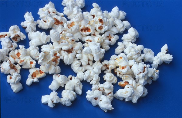 Popcorn spilling out of a bowl