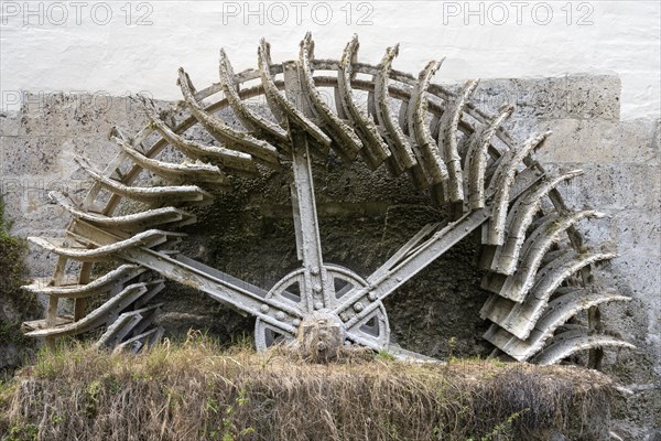 Weathered mill wheel of the former monastery mill in Bad Urach, Reutlingen district,