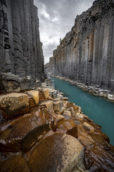 Stuðlagil Canyon, turquoise river between basalt columns, Egilsstadir, Iceland, Europe