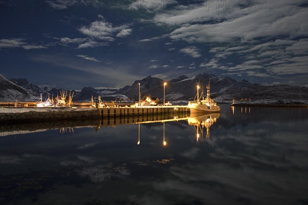 Ramberg harbour at midnight under a full moon in winter
