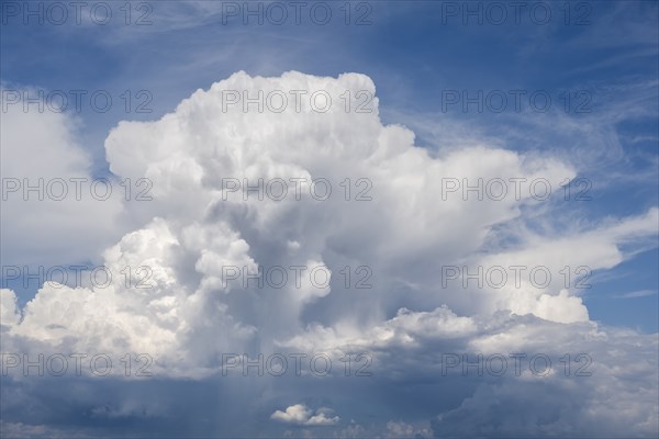 Cumulonimbus, thundercloud against blue sky, Germany, Europe