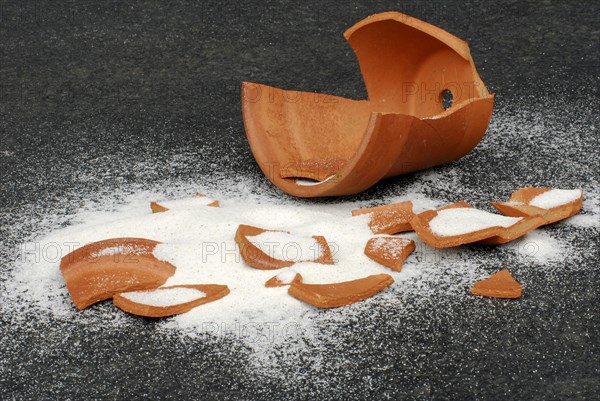 Broken pieces of clay pot and fine sand, clay flower pot