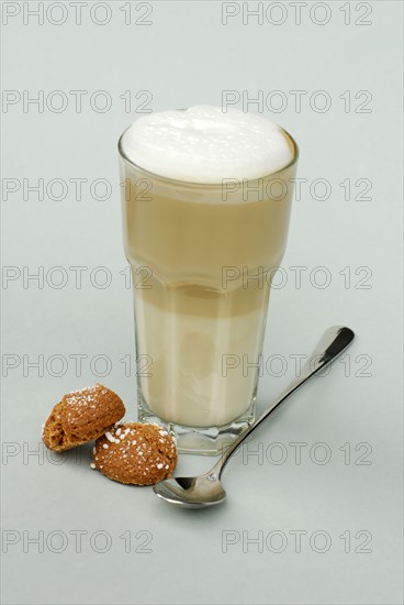 Slat macchiato, spoons and biscuits, biscuits, cookies, glass