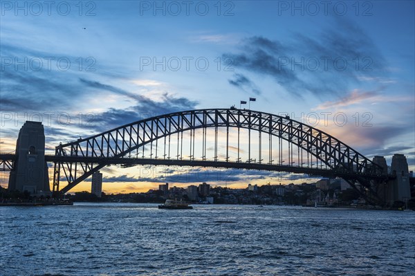Sunset over Sydney harbour bridge Sydney, New South Wales, Australia, Oceania