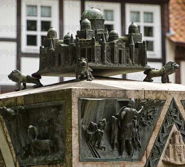 Bronze sculpture with a miniature of the city of Jerusalem on the ashlar of the synagogue memorial,