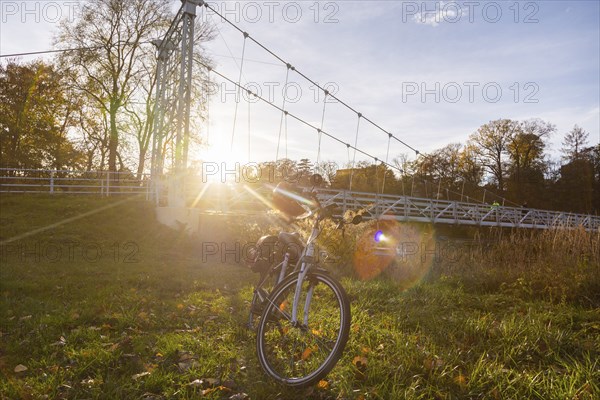 Symbolic image Resting on an e-bike tour in the Leipzig region in Grimma at the Mulde bridge