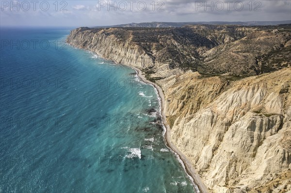 Beach on the cliffs of Cape Aspro near Pissouri seen from the air, Cyprus, Europe