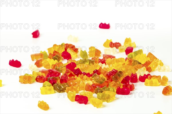 Different coloured gummy bears, on white