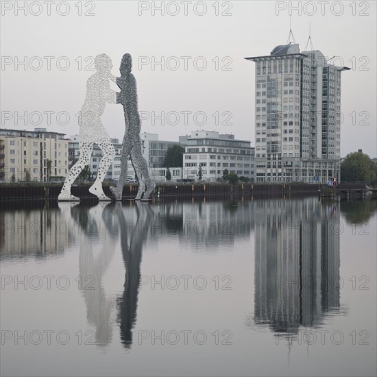 Molecule Man, monumental artwork in the Spree with the Twin Towers Treptow, artist Jonathan
