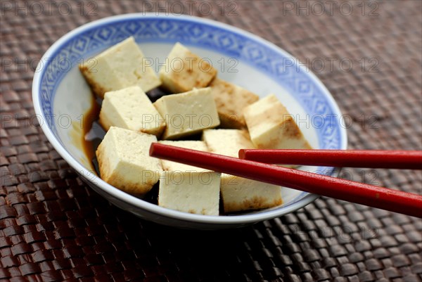 Tofu cubes with soy sauce in a bowl, chopsticks, soy bean curd, bean curd, soy, soy sauce, soy
