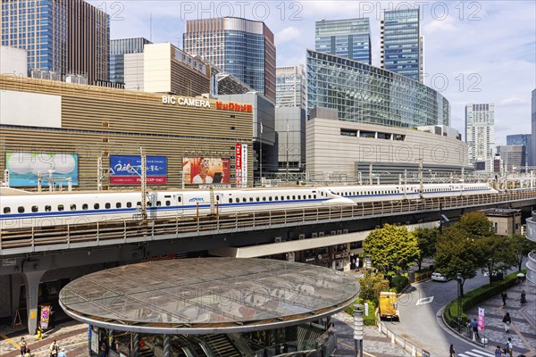 Shinkansen type N700 high-speed trains of Japan Rail JR train at Yurakucho station in Tokyo, Japan,