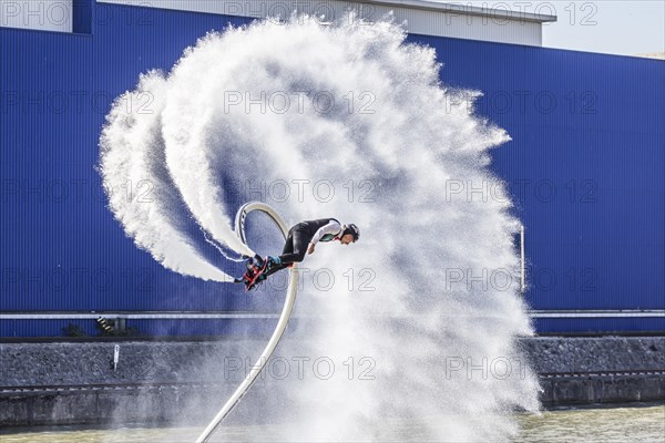 Harbour festival in Stuttgart. Spectacular jet ski and flyboard show on the Neckar. Stuttgart,