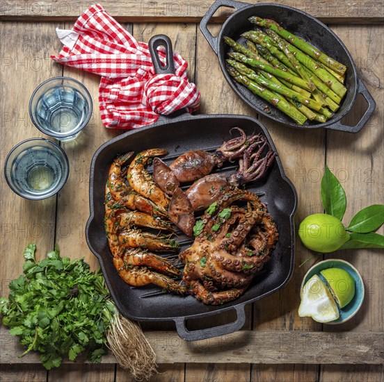 Food, Grilled spimps, squids and octopus in cast iron grill pan
