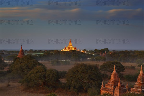 Landscape with illuminated Temples of Bagan in dusk after sunset, Myanmar (Burma)