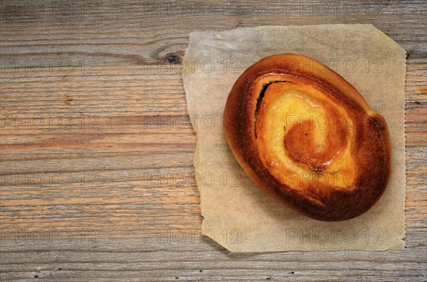 Fresh bun dallas on textural wooden table