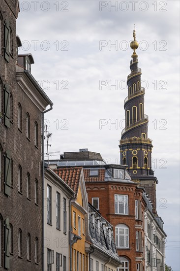 Historic houses, corkscrew-shaped tower of the Evangelical Lutheran Church of the Saviour, in front