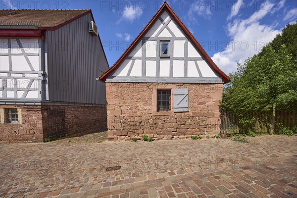 Small half-timbered house on a stone plinth on Hochstraße in Michelstadt, Odenwald, Odenwaldkreis,