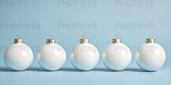 White Christmas tree baubles in a row on pastel blue background. Generative AI, AI generated