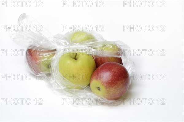 Apple in plastic bag, packaging