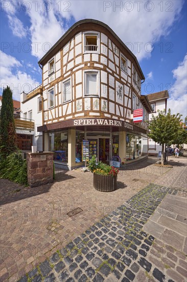 Toy shop in a rounded half-timbered house in Braunstraße in Michelstadt, Odenwald, Odenwaldkreis,