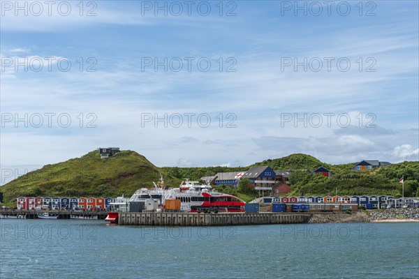 View from the Binnenreede to the inland harbour with the high-speed catamaran Halunder Jet,