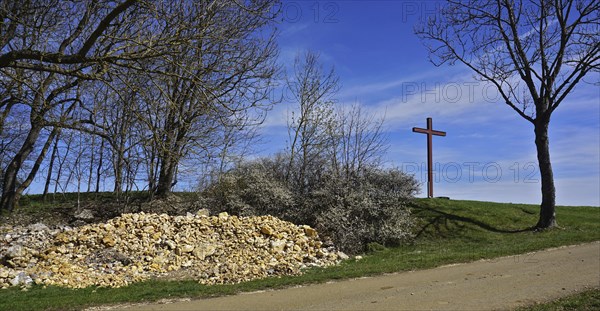 Fieldstone camp and wayside cross on the Swabian Alb, Baden-Württemberg, Germany, Fieldstone camp