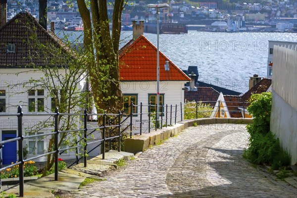Bergen, Norway, May 2015: Cozy cobblestoned street in the historical center of Bergen, Norway,