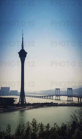 Macau tower urban landmark skyline and taipa bridge in macao china