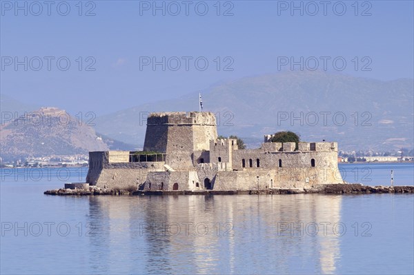 The castle of Bourtzi in the bay of Nafplio, Greece, Europe