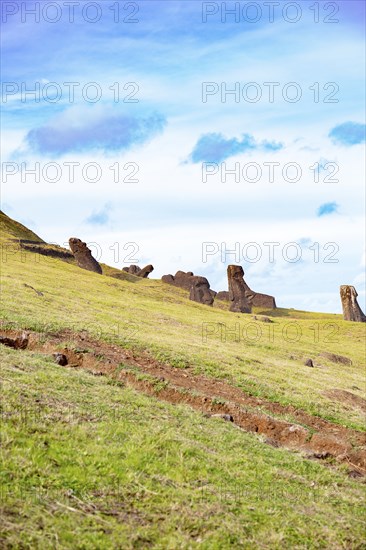 Moai on Ranu Raraku Volcan. Ester Island Landscape