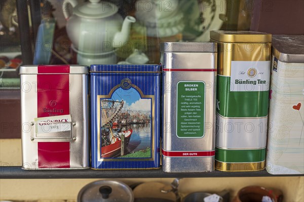 Old Bünting tea tins in front of a shop, Leer, East Frisia, Lower Saxony, Germany, Europe