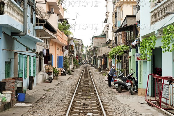 Asian travel tourism holidays vacations tourist east orient oriental modern railway poverty housing