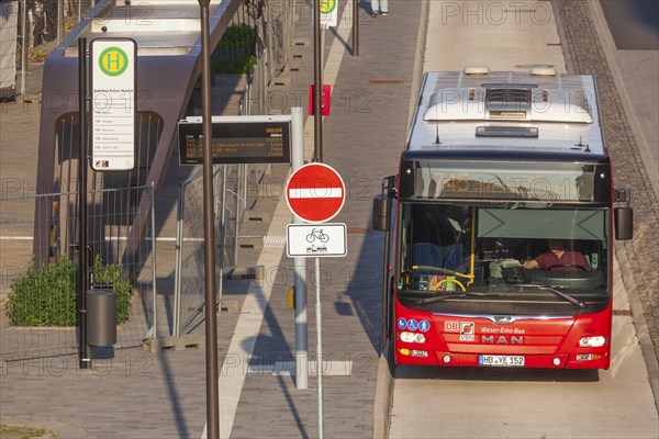 Bus stop with bus, Achim, Lower Saxony, Germany, Europe