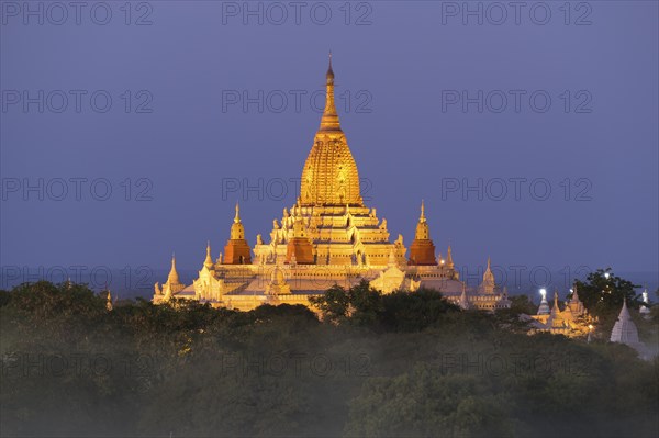 Illuminated Ananda Temple Pagoda (Paya) in Bagan at night, Myanmar (Burma)