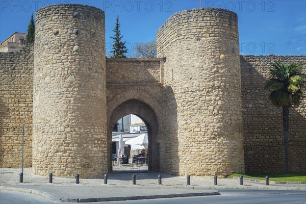 Ronda, Spain, April 2023: View on the Puerta de Almocabar, ancient gate to the town of Ronda,