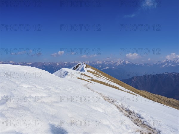Trail on the range of Pizzo Baciamorti mountain