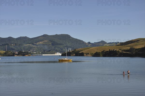 People at a beach in Otago Harbour near Dunedin, South Island, New Zealand, Oceania