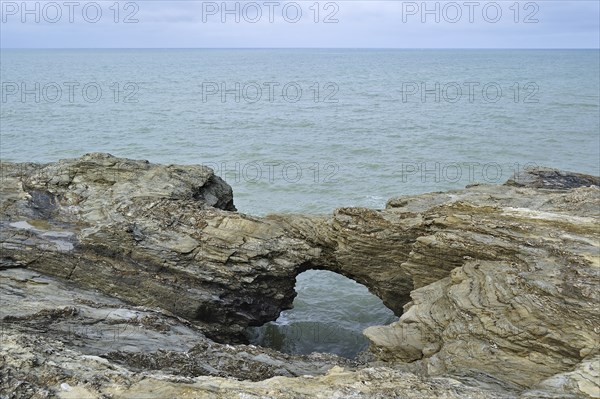 The eroded rock formation Le Trou du Diable at Saint-Hilaire-de-Riez, La Vendée, Pays de la Loire,