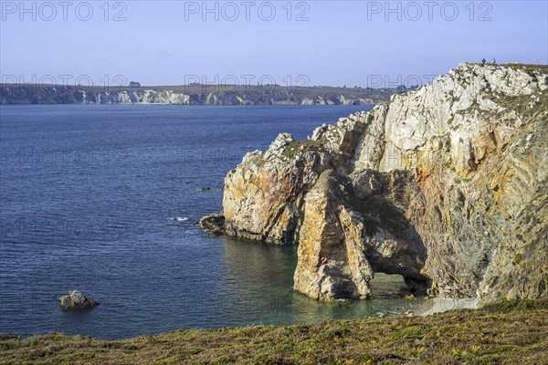 Natural arch in sea cliff along the Iroise Sea at the Pointe de Dinan, Cap de la Chèvre on the