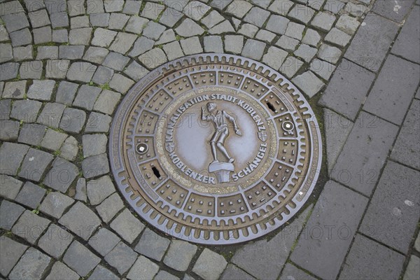 Manhole cover with landmark Schängel and inscription, floor, paving stones, Florinsmarkt, Old Town,