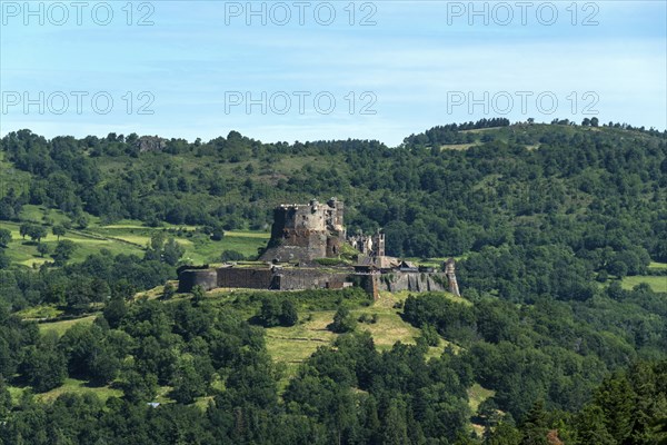 View of the medieval castle of Murol in the Auvergne Volcanoes Regional Natural Park, Puy de Dome,