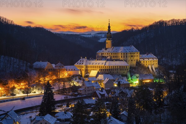 Winter evening in the Müglitz valley, impressively illuminated Weesenstein Castle at the blue hour,