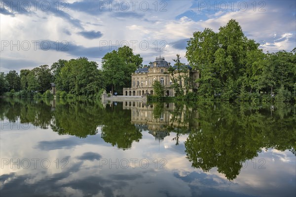 Seeschloss Monrepos is reflected in Lake Eglosheim, Ludwigsburg, Baden-Württemberg, Germany, Europe