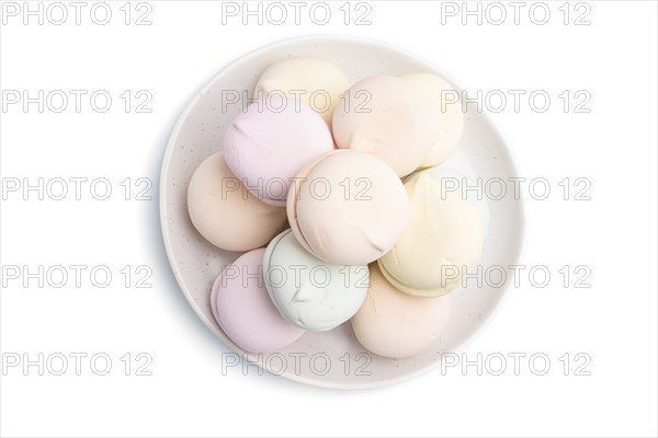 Colored zephyr or marshmallow isolated on white background. Top view, close up
