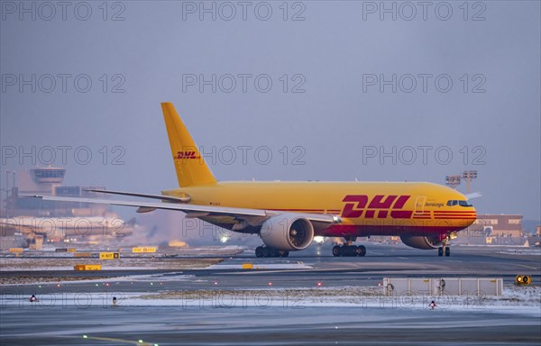 DHL, AeroLogic, Boeing 777F, on the taxiway to Runway West, Frankfurt FRA Airport, Fraport, in