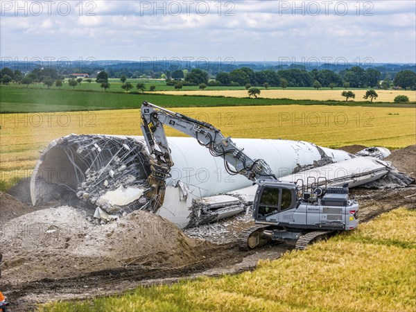 Demolished tower of a 20 year old wind turbine, in the Werl wind farm, 5 old Enercon E-66 turbines