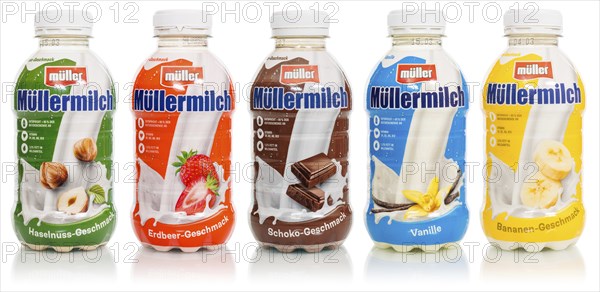 Muller's milk of various flavours in bottles from Theo Müller, cropped against a white background