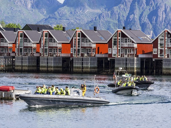 Rib boats with tourists return to Svolvær harbor, Svolvær, Lofoten, Norway, Europe