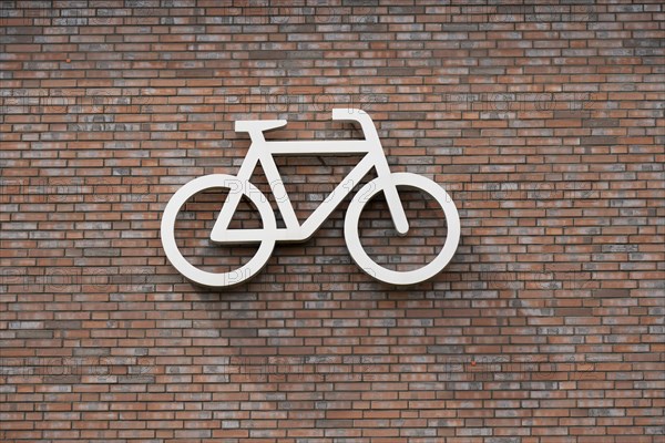 Bicycle symbol on a wall, pictogram, bicycle car park, Dülmen, Münsterland, North Rhine-Westphalia,