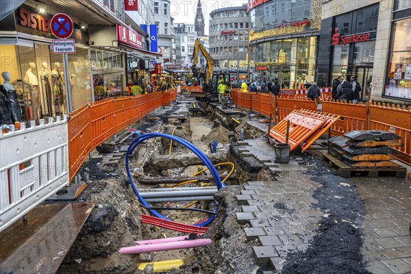 Construction site in the city centre of Wuppertal, laying of new pipelines, various supply lines